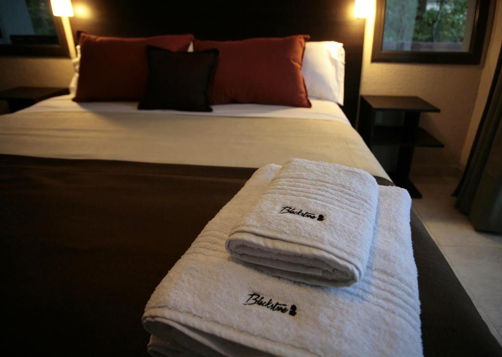 Blackstone Apart Boutique Hotel Villa General Belgrano Room photo